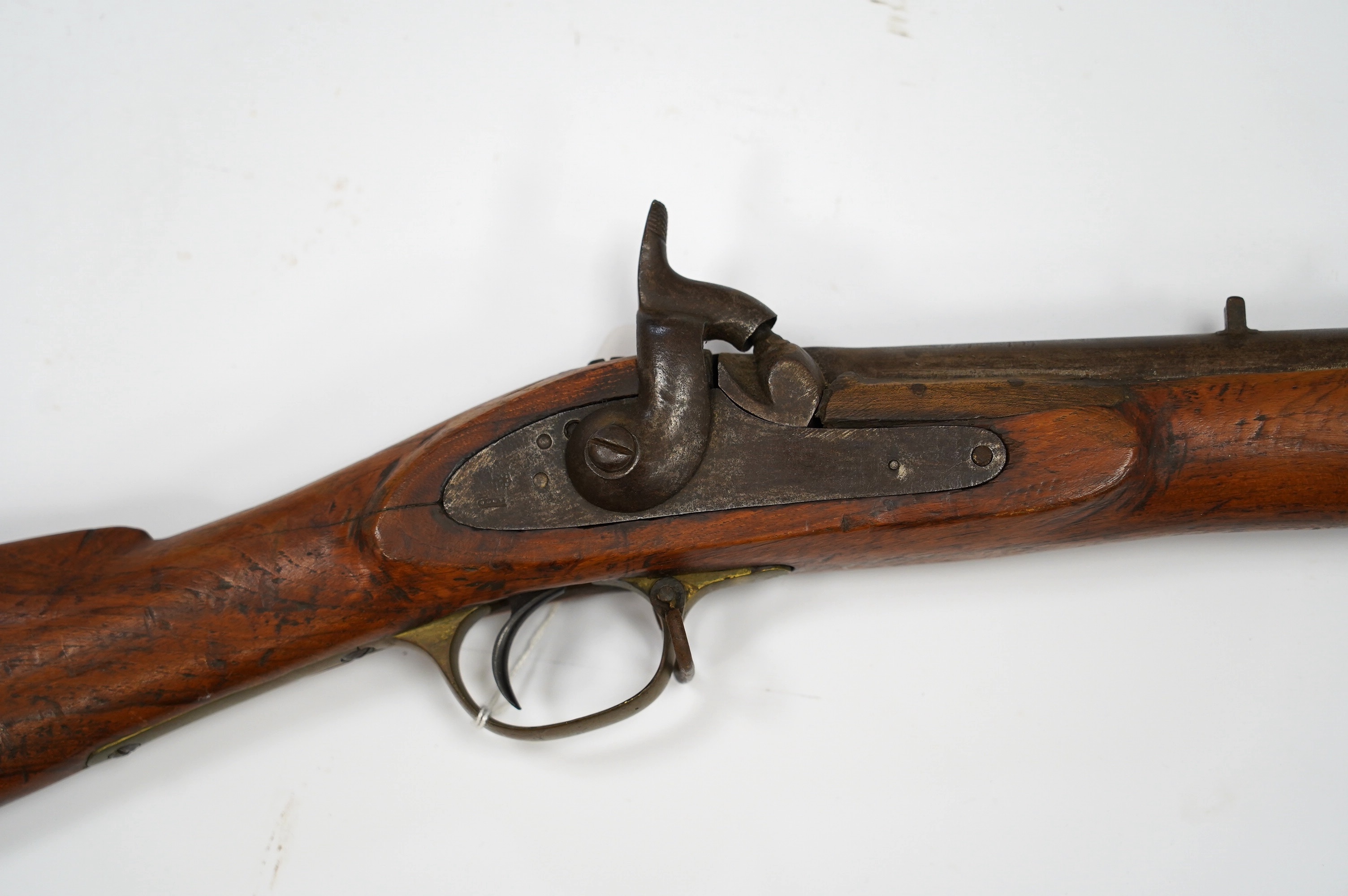 A decorative Indian military three band percussion musket, brass mounts, steel barrel bands and ramrod, barrel 98.5cm. Condition - fair, some age wear overall